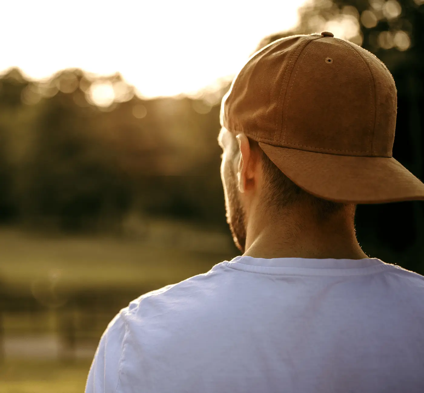 Man reflecting in nature at sunset during an intermittent fasting window